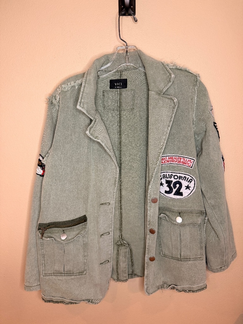 Vici. Military style green jacket with patches. Size XS